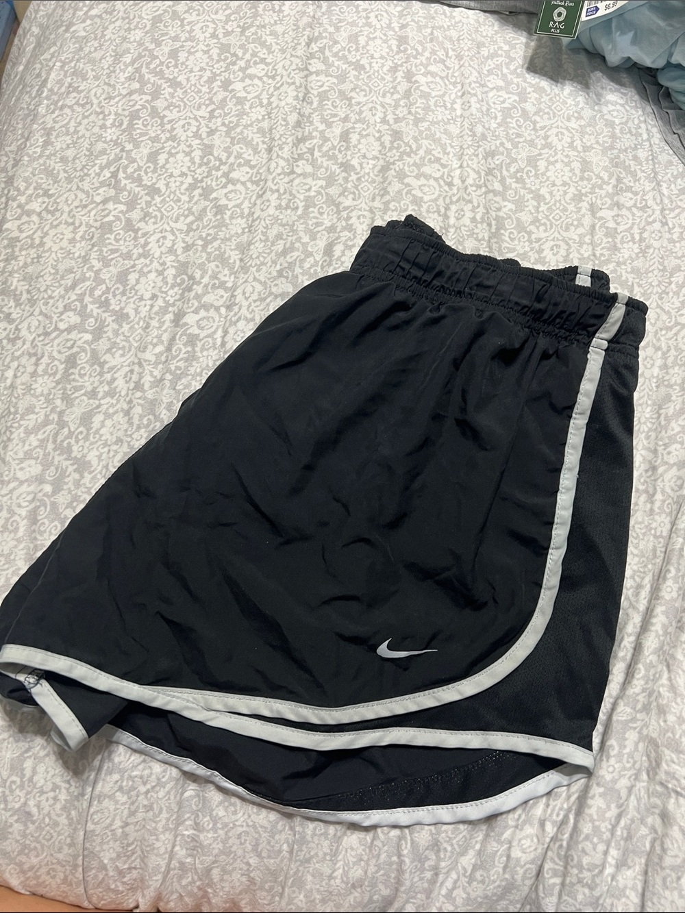 Nike Women’s Black Athletic Shorts with White Piping
